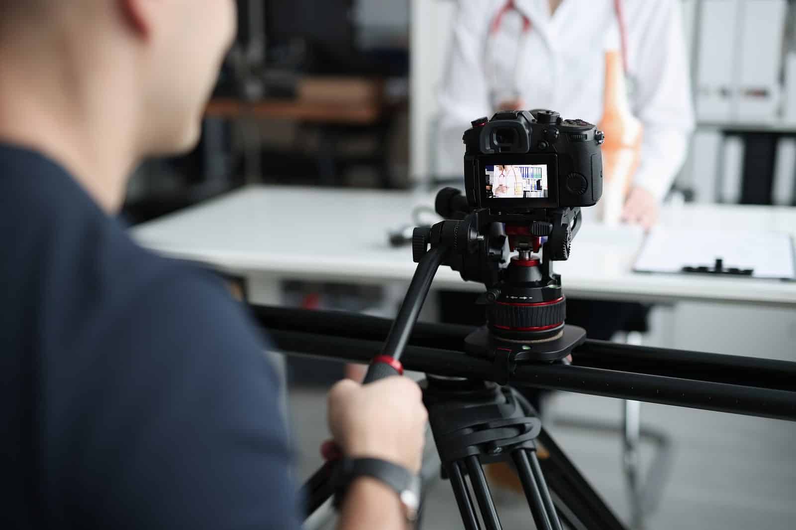 Image of a person recording a vlog as part of corporate storytelling efforts for a business