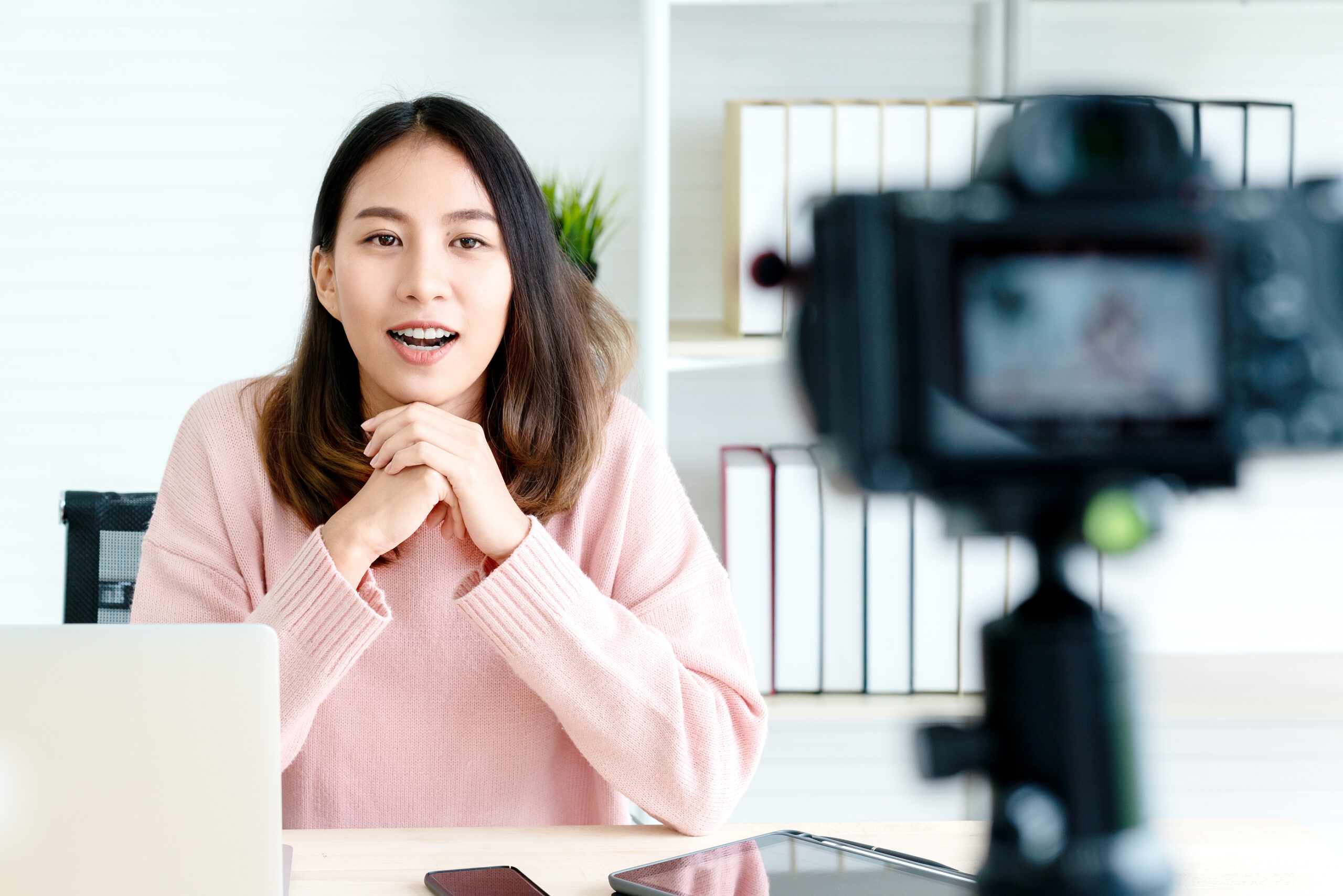 Image of a woman making a video