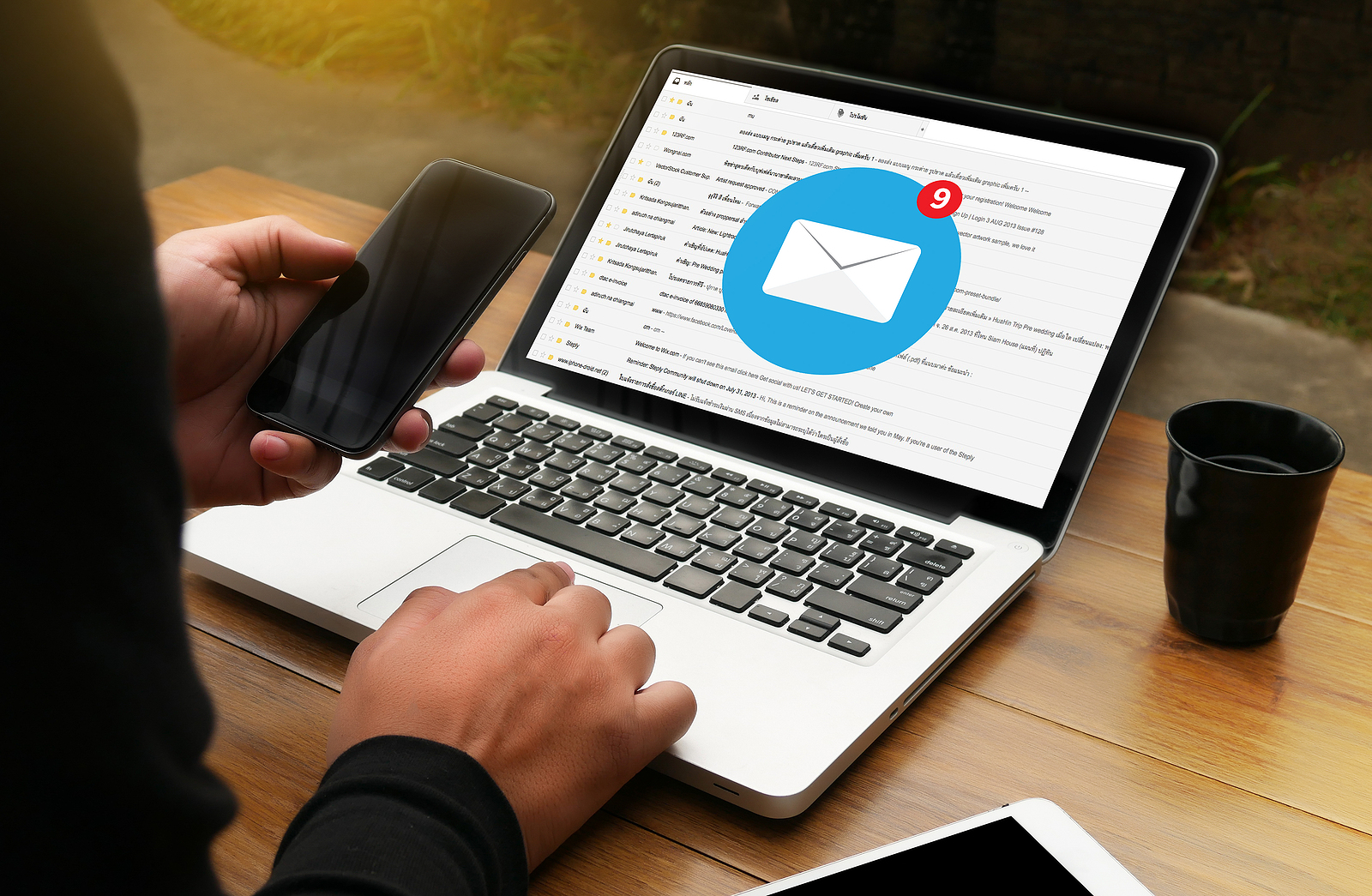 A person with their email inbox open on their laptop